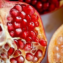 Open pomegranate fruit showing kernels